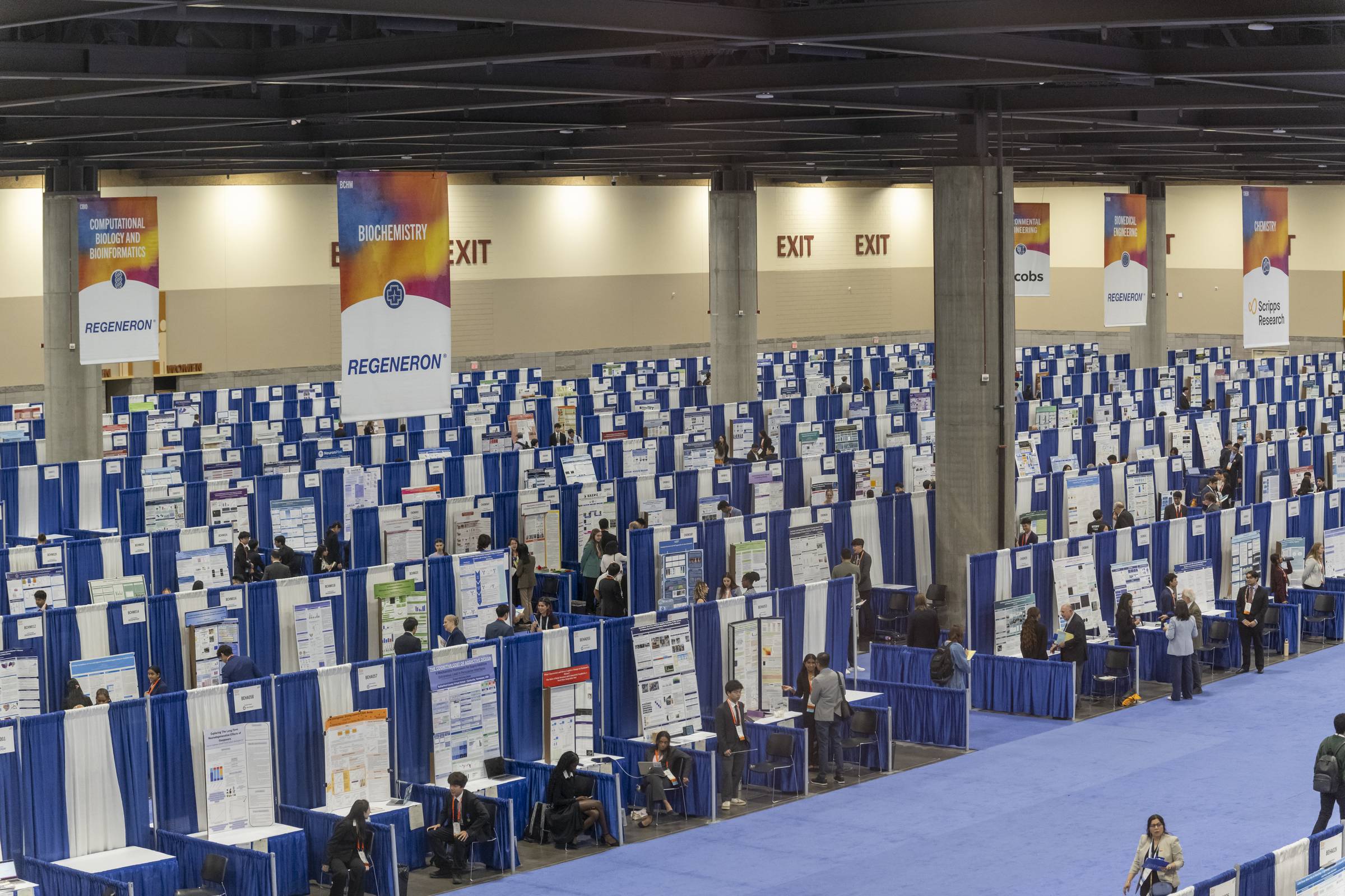 The Regeneron ISEF competition floor, rows of finalist booths filling the convention hall, progressively struck through with hand-drawn red pen marks until the whole field is crossed out