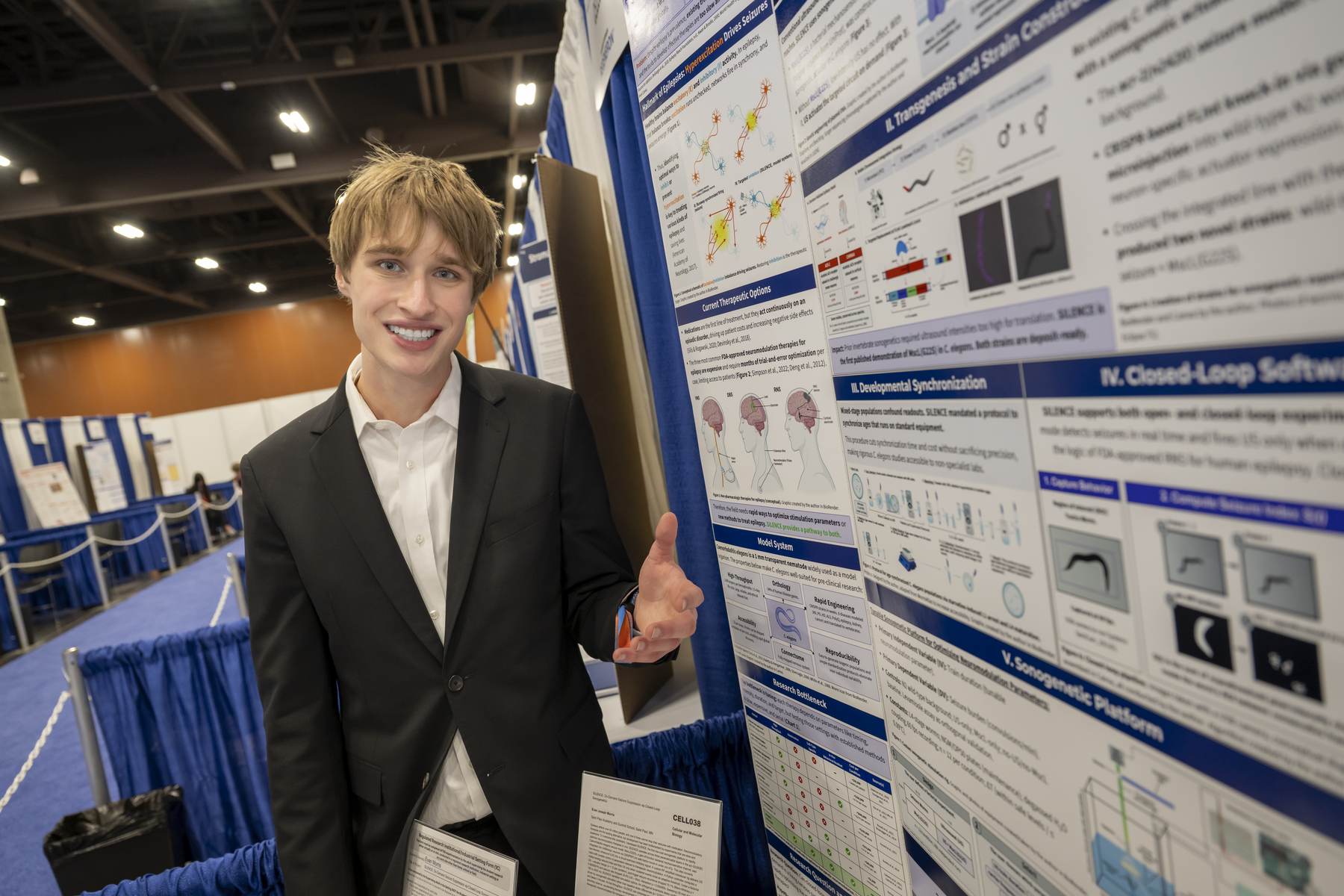 Evan Morris at his research booth at Regeneron ISEF 2026
